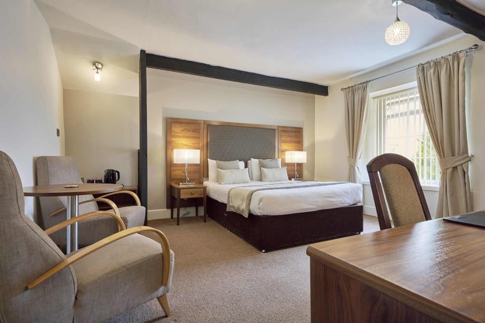 Superior Room (Courtyard Suite) | Iron/ironing board, free WiFi, bed sheets