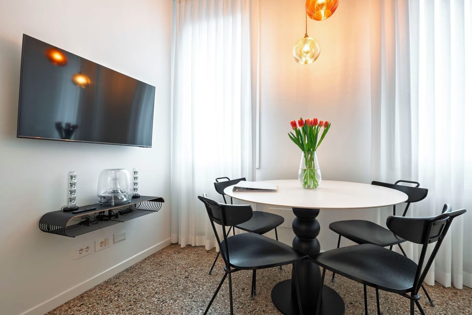 Superior Apartment, City View | Living area | Flat-screen TV