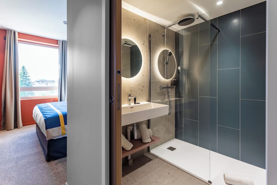 Standard Double or Twin Room | Bathroom | Shower, hair dryer, slippers, towels
