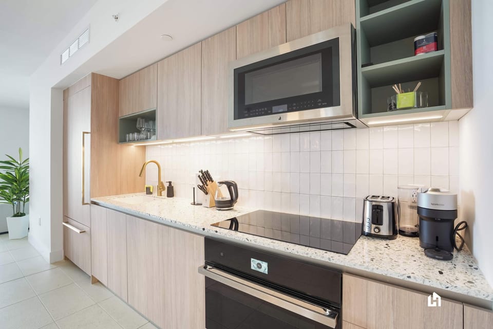 Modern kitchen with stainless steel appliances - cook like a pro!