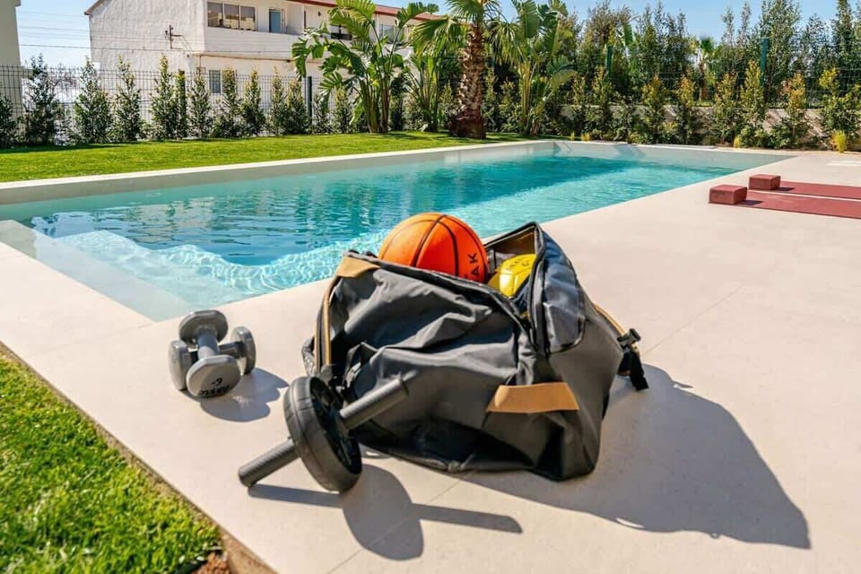 Stay active with a complete sports and fitness kit, including dumbbells, resistance bands, a basketball, and a football. Whether you prefer a poolside workout or a game at the nearby sports field, everything is ready for you to enjoy