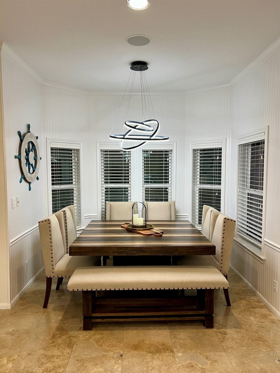 Gorgeous dining room table comfortably seats eight