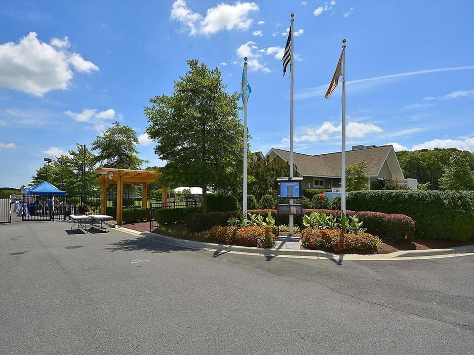 Resort entrance with a welcoming gatehouse, ensuring security and easy access to the community.