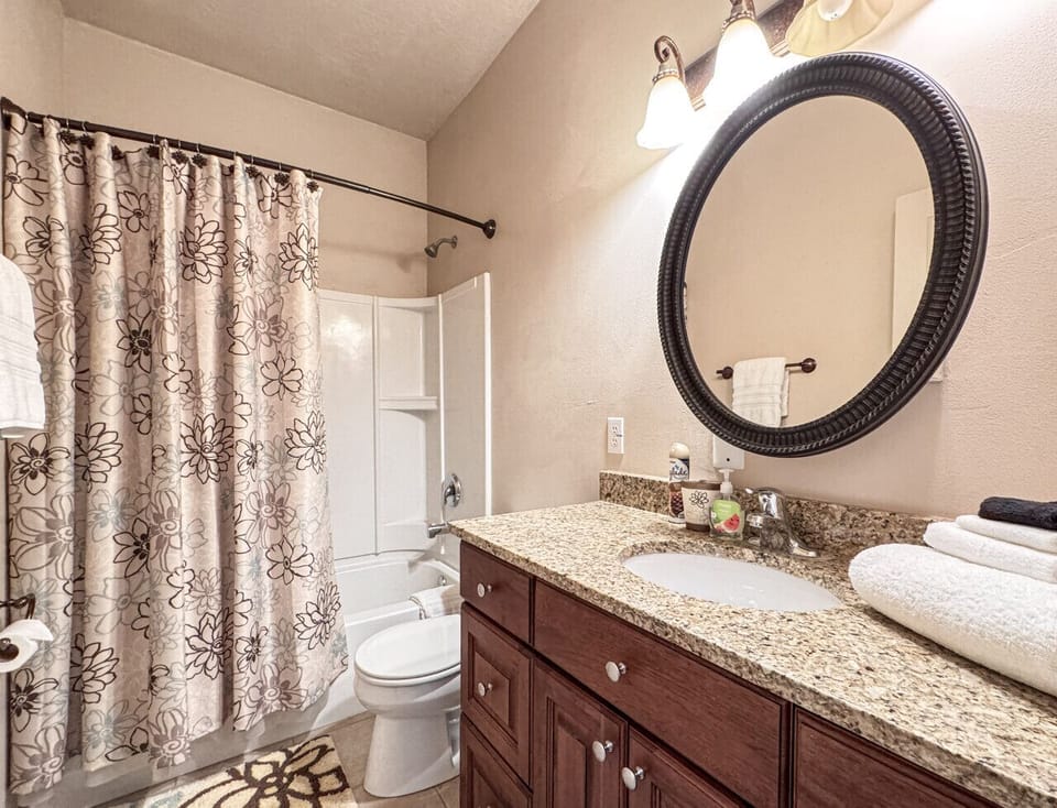 Bright, clean, and cozy making this bathroom perfect for a refreshing start or relaxing unwind.