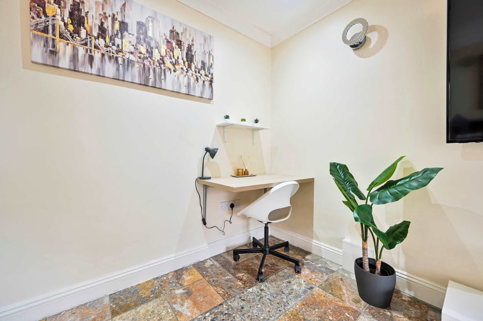 Dedicated workspace with desk and chair — perfect for longer working stays