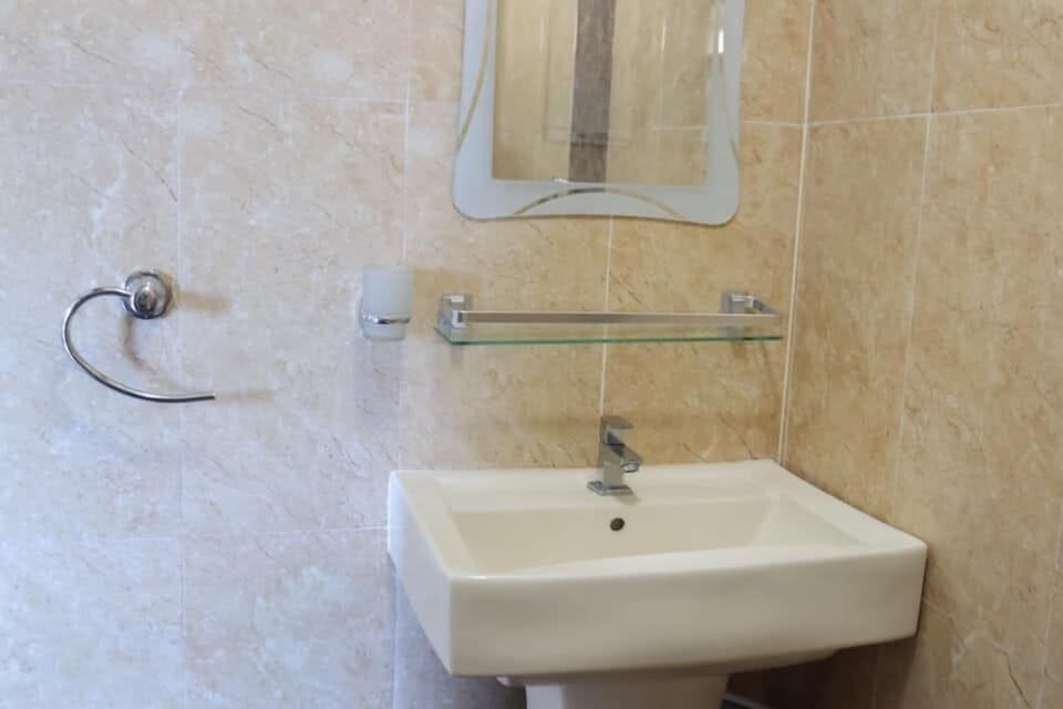 Shower, free toiletries, slippers, towels