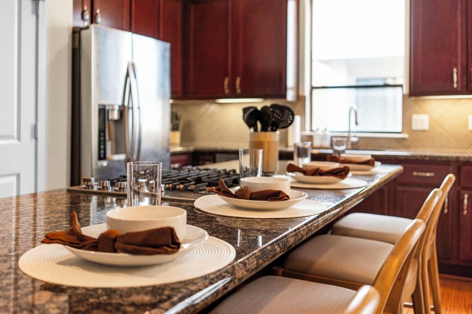 Table set up for the kitchen island dining