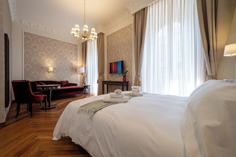 Family Triple Room | Blackout drapes, free WiFi, bed sheets