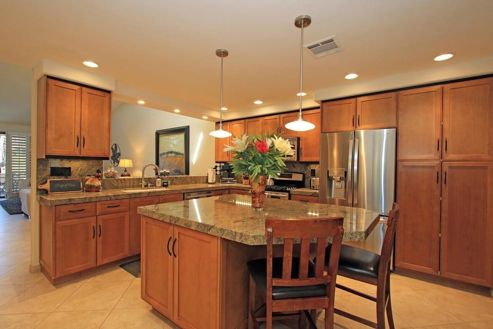 Fully stocked kitchen with drip coffee maker, Keurig and esspresso maker