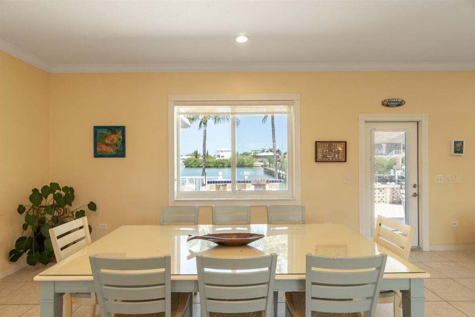Spacious dining area perfect for family meals after fishing or beach days.