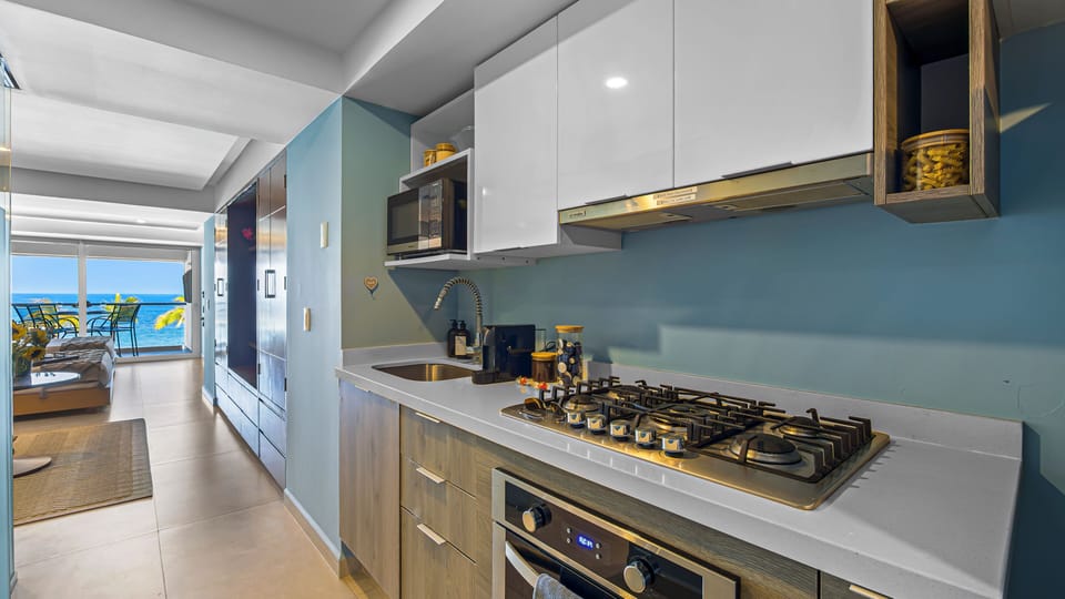 Comfort Apartment, 2 Queen Beds, Balcony, Beach View | Private kitchen | Coffee/tea maker, electric kettle