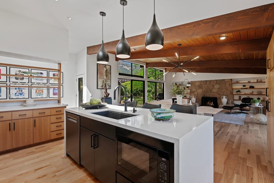 Open perspective from the kitchen into the main living room