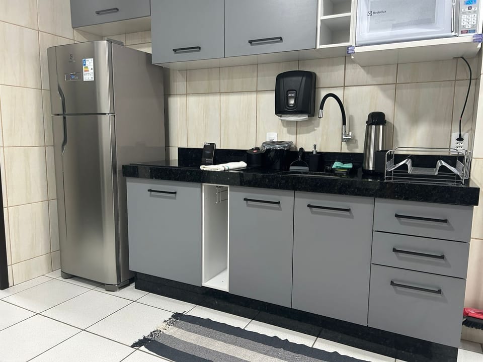 Family Apartment, City View | Private kitchen | Electric kettle