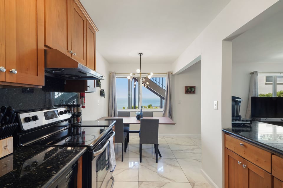 Family Apartment, 2 Bedrooms, Patio | Private kitchen | Coffee/tea maker, dining tables