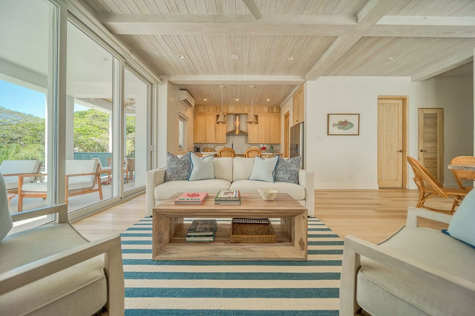 Large unit streaming with natural light and beach views