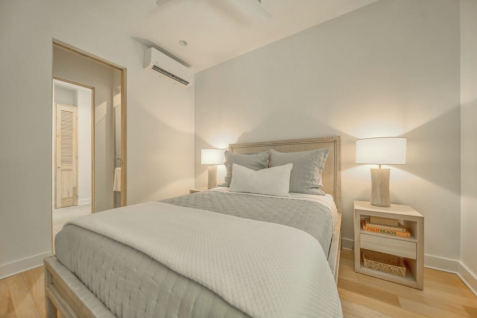 Guest Bedroom with Queen bed with both privacy and blackout shades