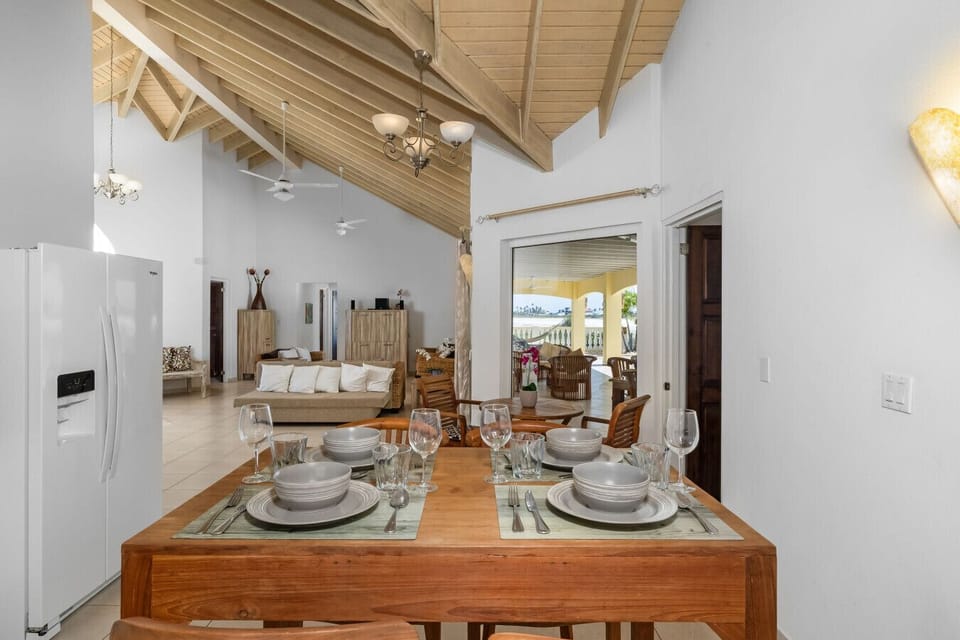 Gather around! This charming dining area is perfect for sharing meals and making memories with loved ones.