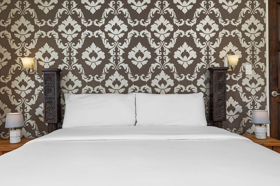 Step into this cozy retreat! With its stylish decor and inviting vibe, this bedroom is all about comfort and relaxation.