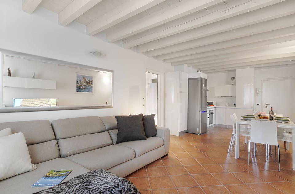 Standard Apartment, Multiple Bedrooms (Magnolia House) | Living area | 21-inch Smart TV with cable channels