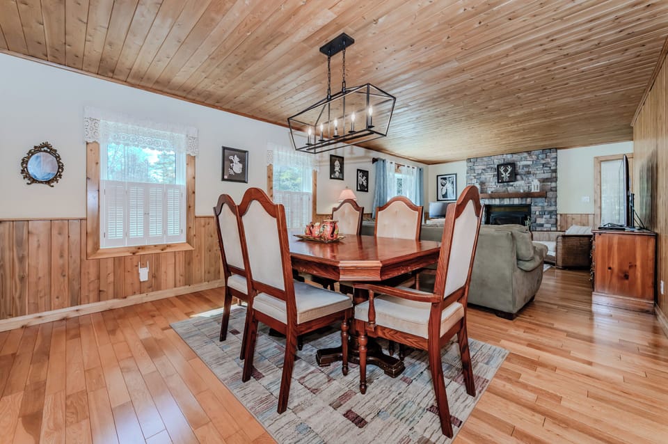 Gather around the wood-accented dining space for memorable meals with family and friends—perfect for slow travel and holiday feasts.