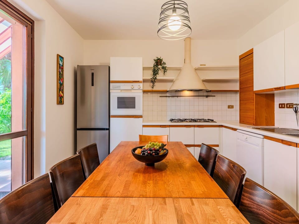 Furniture, Interior Design, Flooring, Wood, Floor, Light Fixture, Ceiling, Kitchen, Countertop, Room