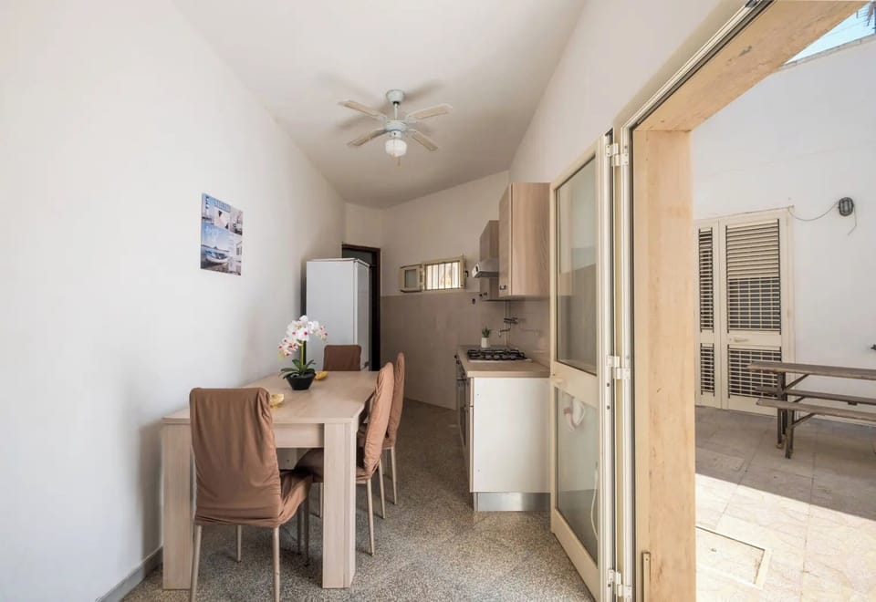 House | Private kitchen | Fridge, stovetop, cookware/dishes/utensils, dining tables