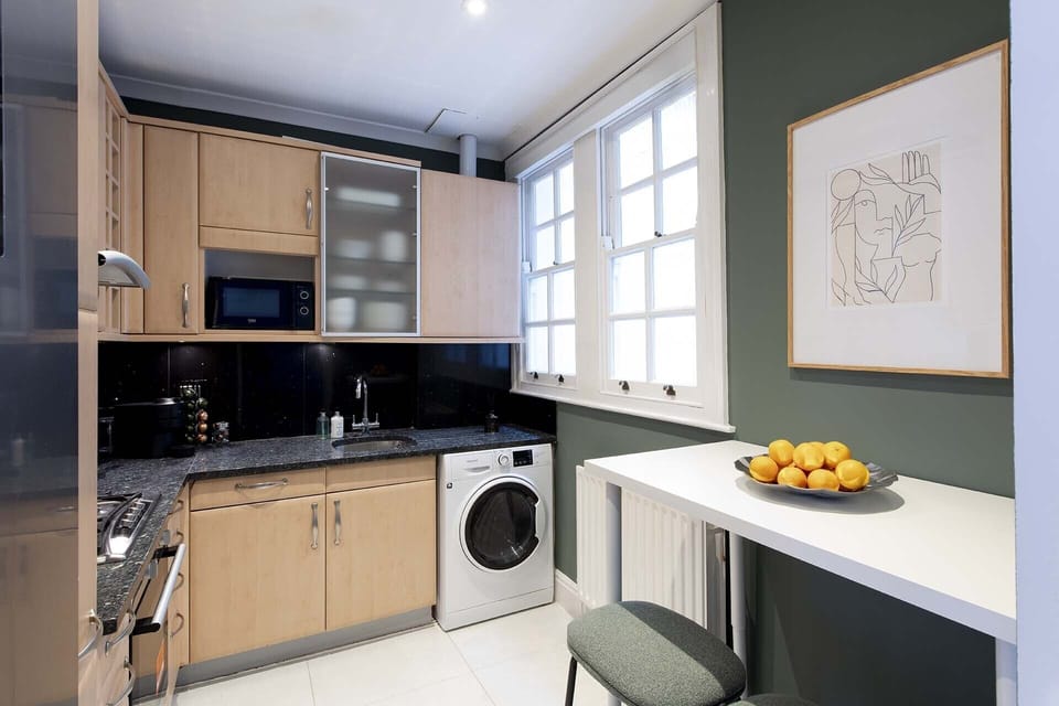 Fully equipped kitchen next to the dining area.