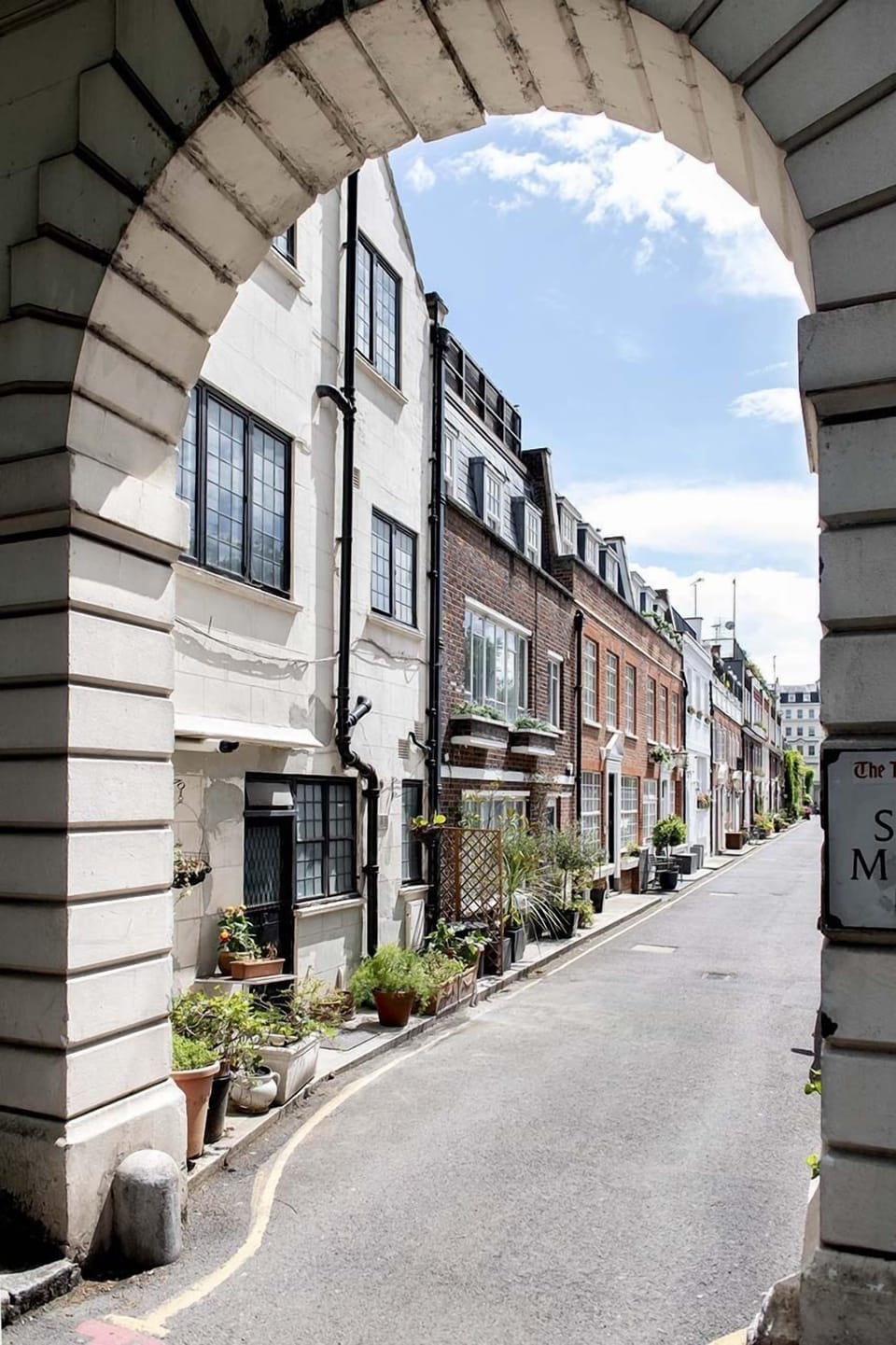 You'll fall in love with the private setting of this mews home.