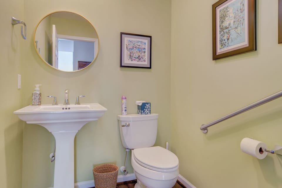 Down the hall you'll find a Half Bathroom