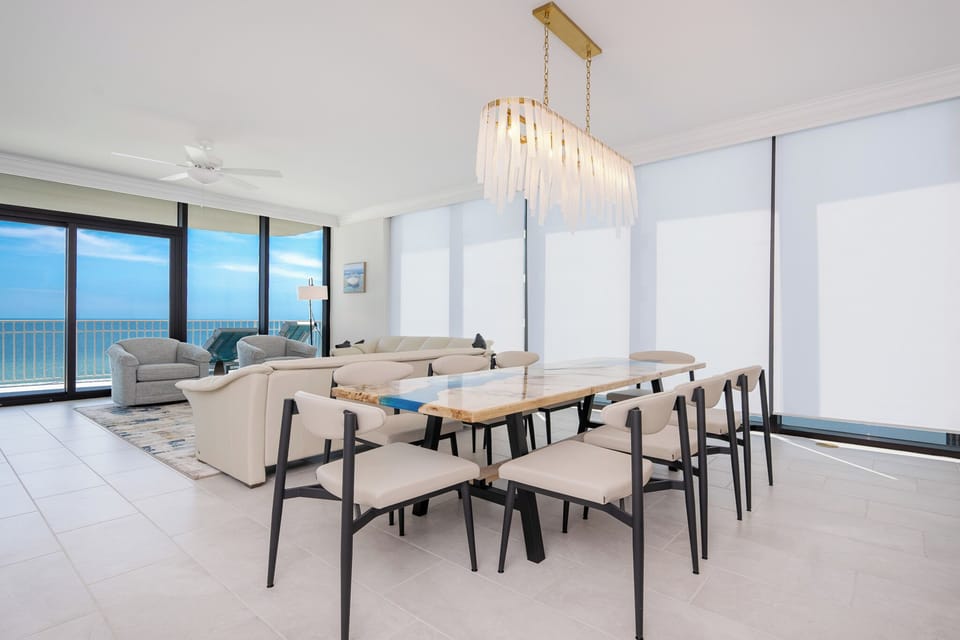 Enjoy the stylish chandelier at the dining table and take in the sights and sounds of the coast