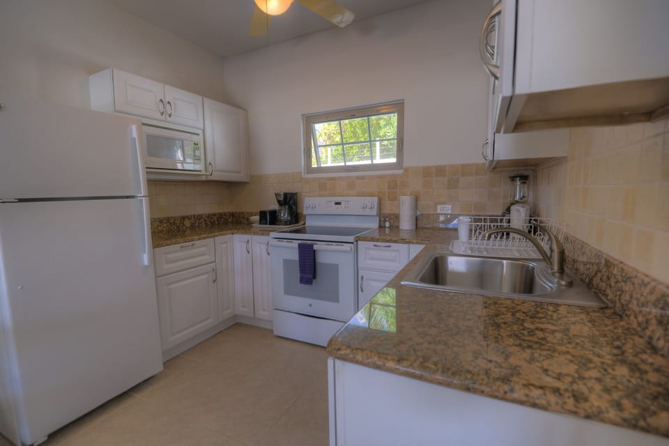 2 Bedroom Poolside | Private kitchen | Fridge, microwave, oven, stovetop