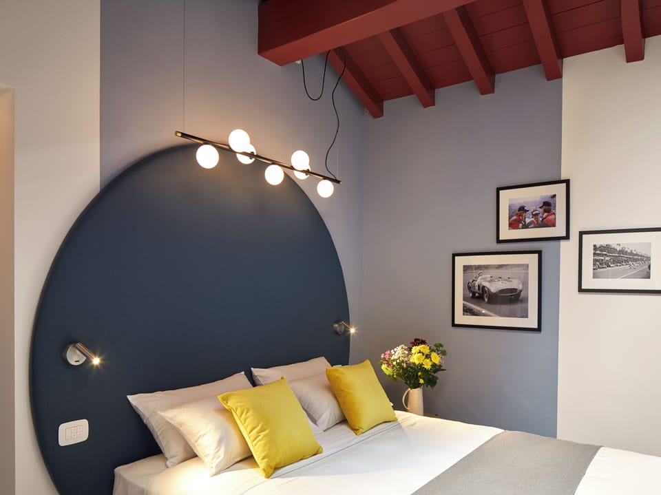 Deluxe Double Room, Courtyard View | In-room safe, desk, laptop workspace, blackout drapes