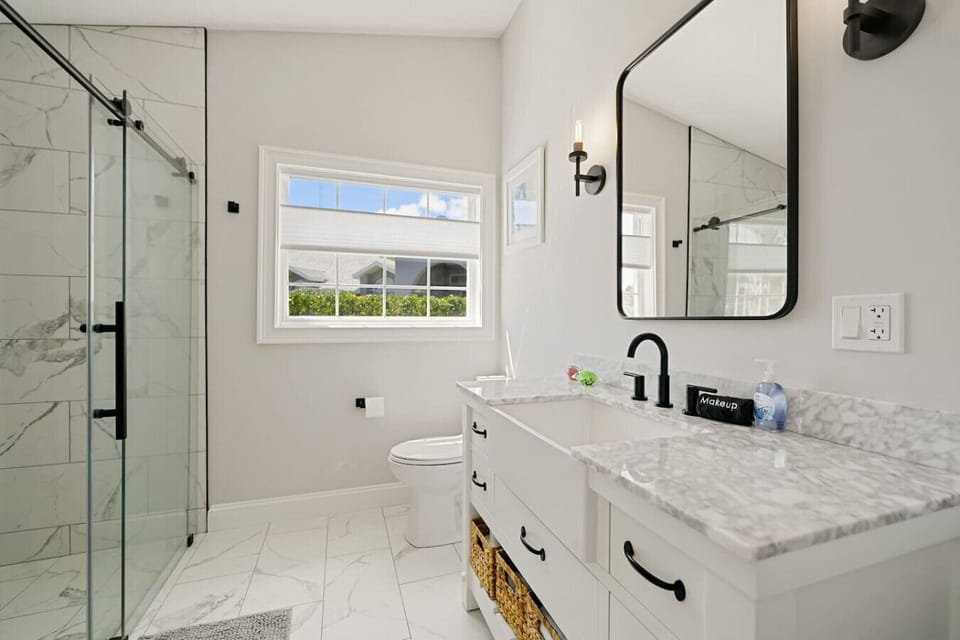Modern full bath featuring a spacious walk-in shower.