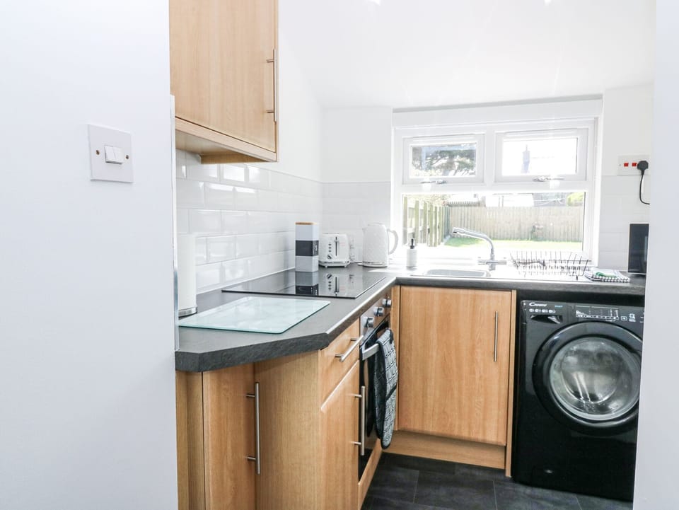 Fridge, microwave, toaster, cookware/dishes/utensils
