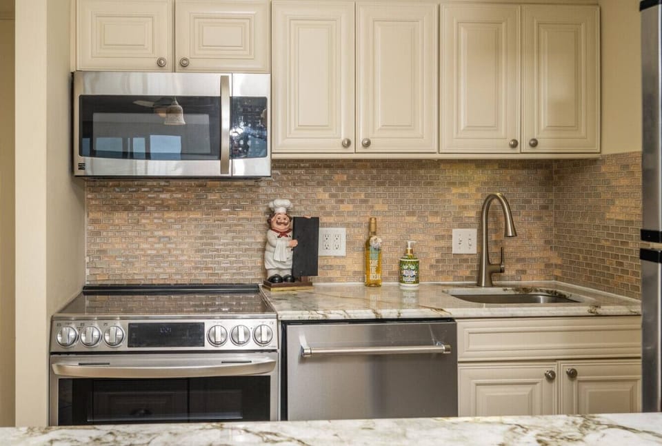 A warm, inviting kitchen space stocked with all the essentials for your convenience.