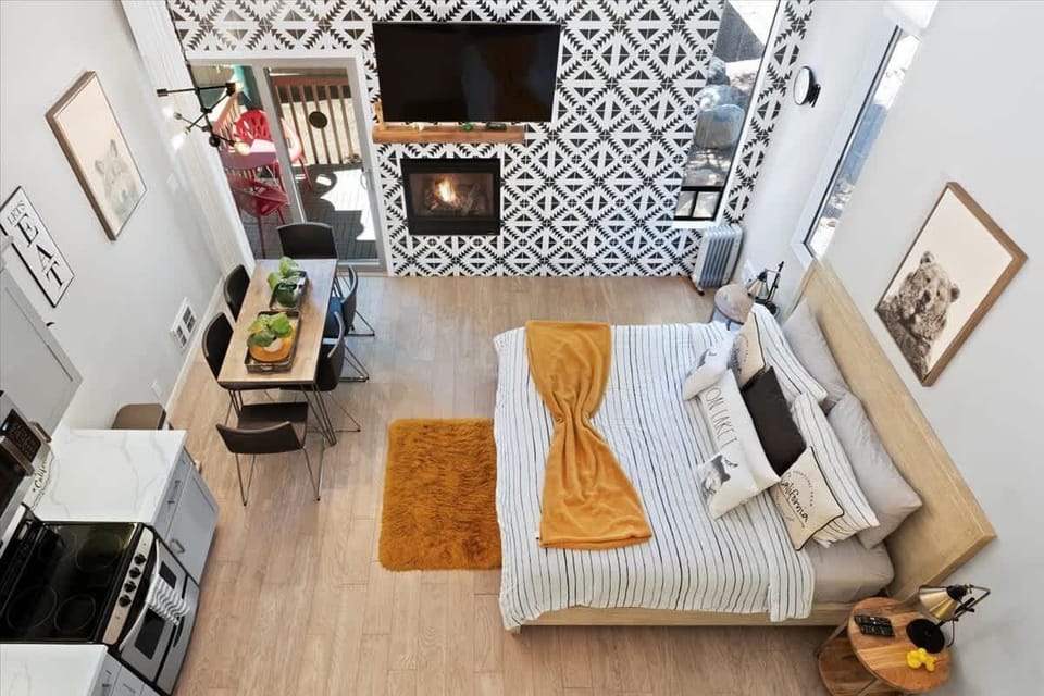 A spacious room with clean lines, minimal décor, and a welcoming bed ready for restful nights. 🌙