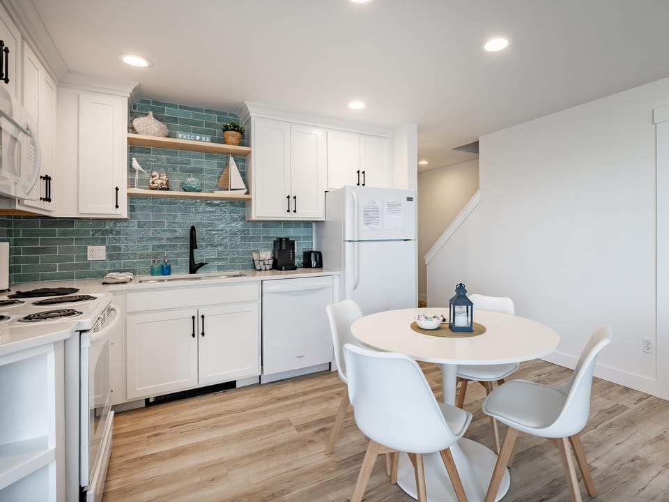 Bright, modern kitchen and dining area with cozy charm
