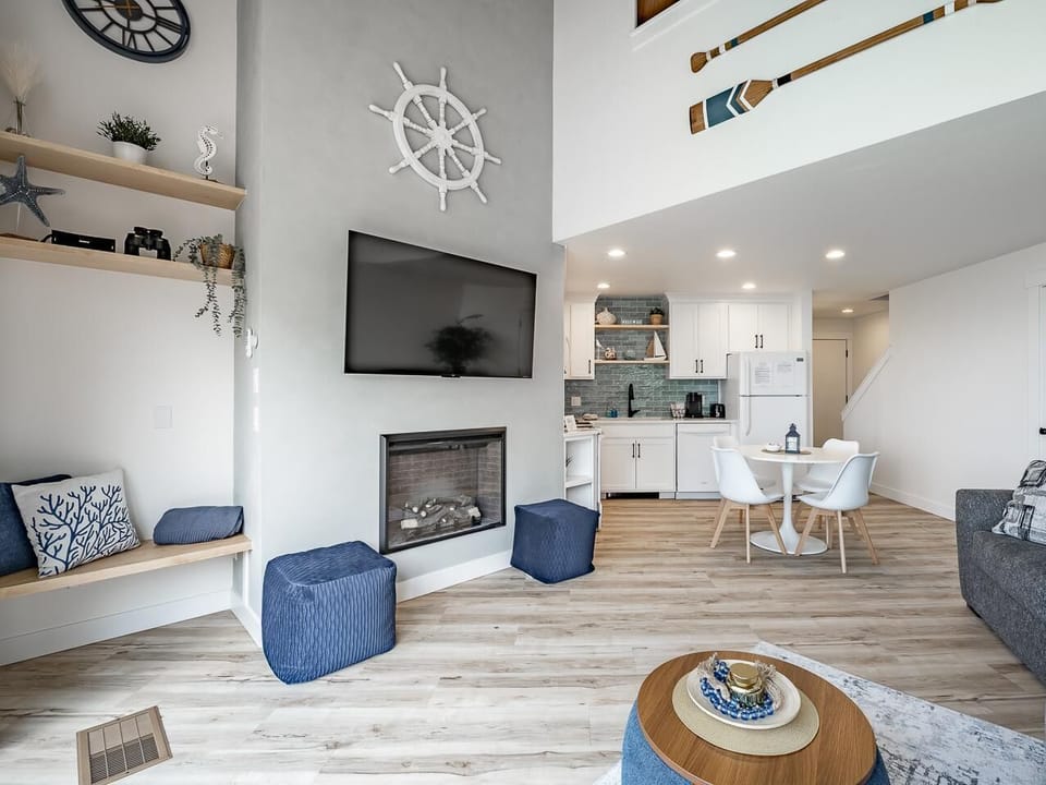 Cozy living room with modern electric fireplace and nautical charm