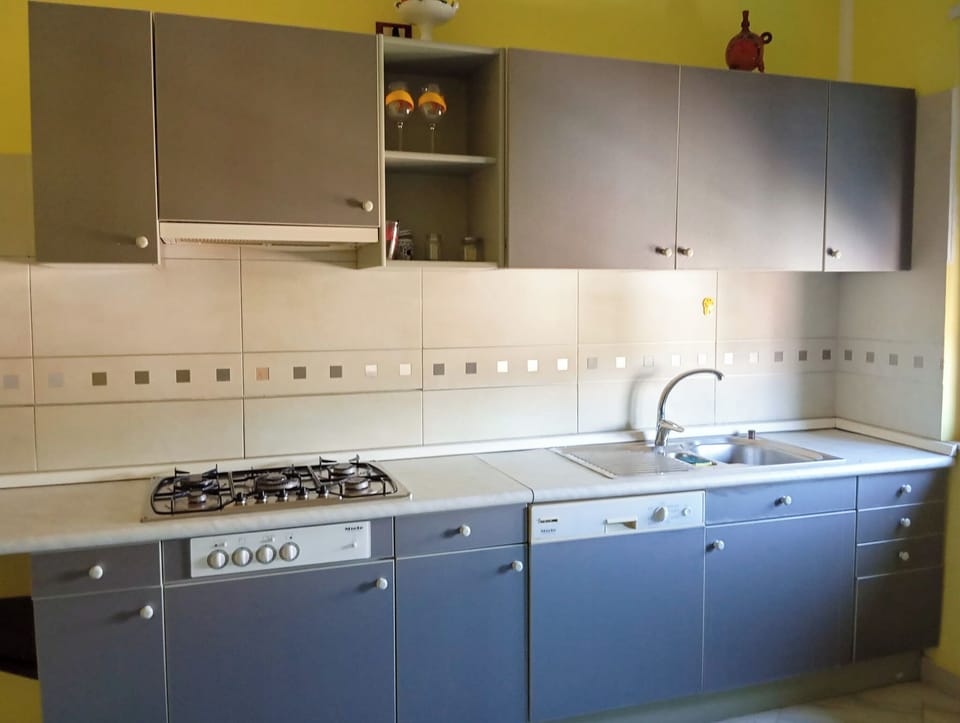 Apartment, Balcony | Private kitchen | Coffee/tea maker