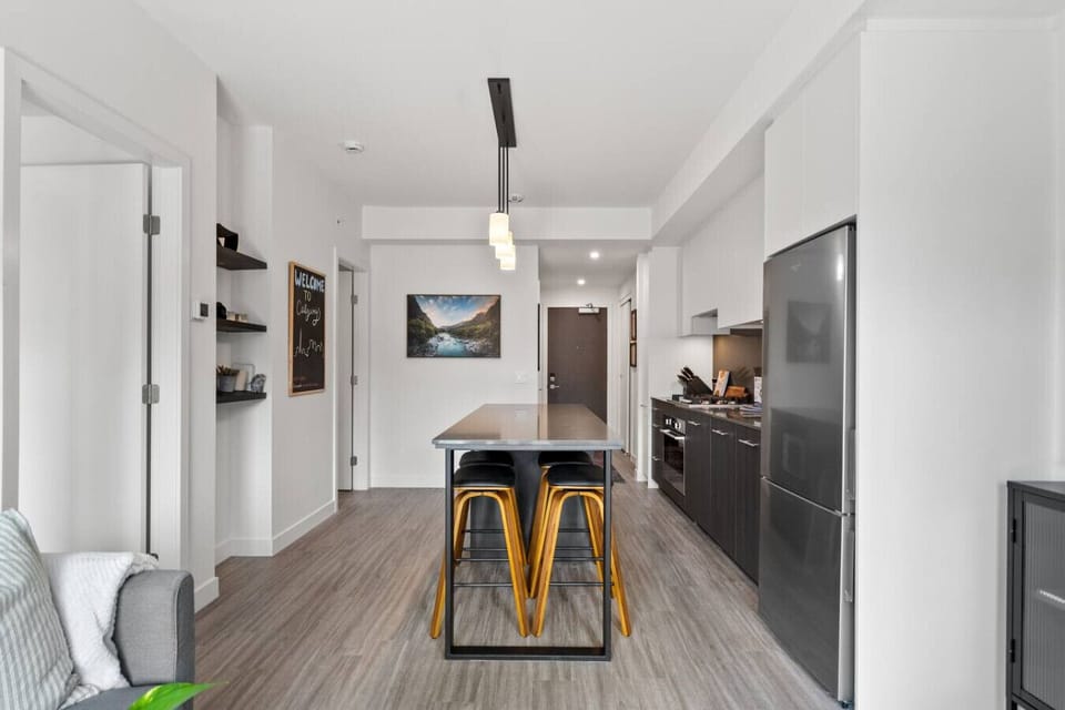 Full kitchen with a drip coffee maker, ground coffee, tea & sugar.