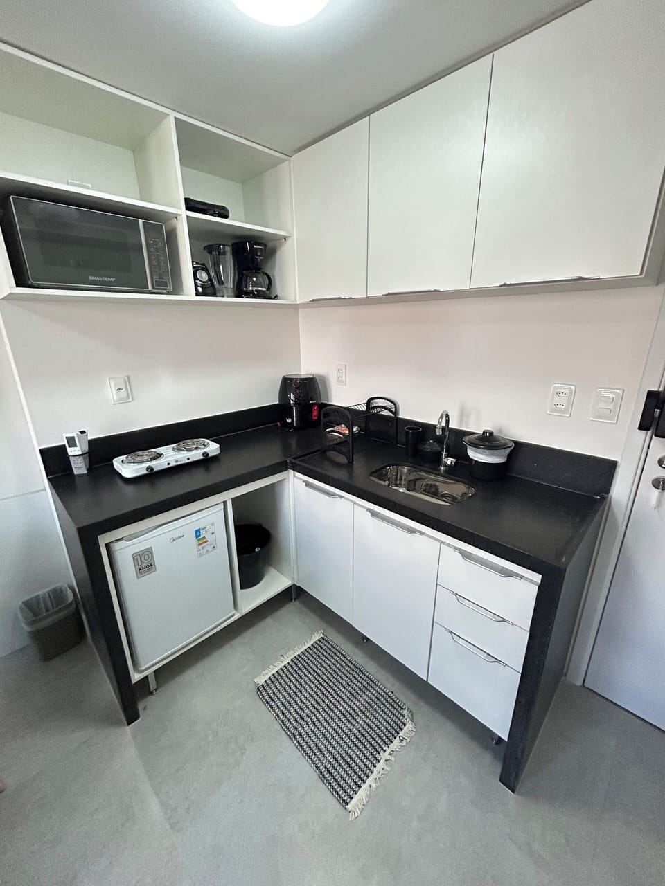 Apartment | Private kitchen | Mini-fridge, microwave, stovetop, cookware/dishes/utensils