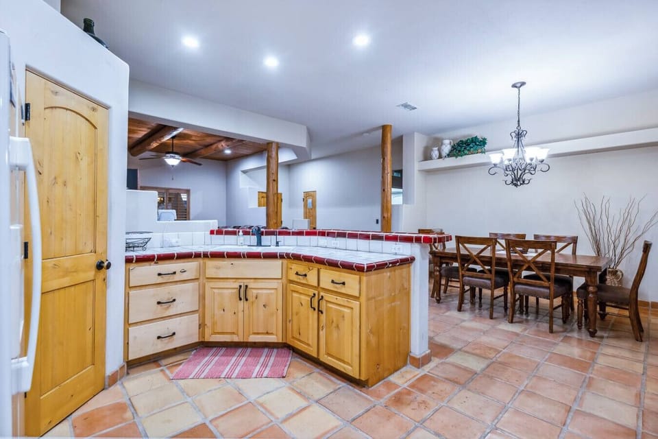 Fully equipped kitchen opens into the dining space