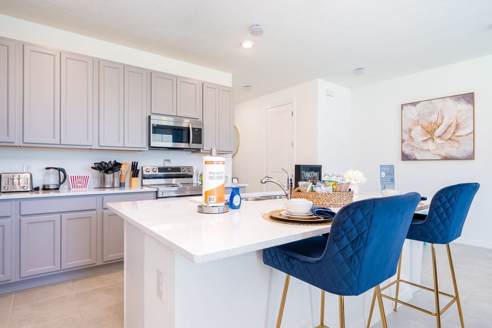 Sip morning coffee or enjoy a meal at the kitchen counter, with seating for 2