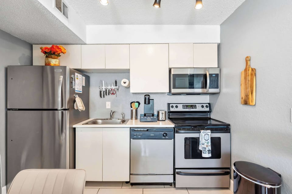 The kitchen offers storage space & all the comforts of home