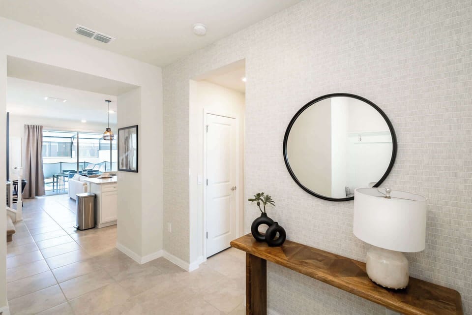 A bright, airy entryway will welcome you home