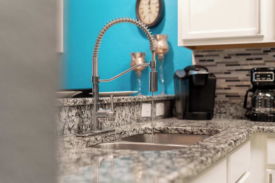 The open, airy kitchen offers ample space & all the comforts of home