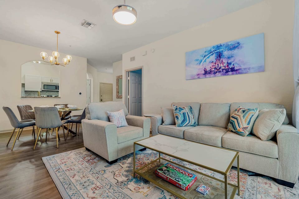 Bright living space with sofa sleeper and Smart TV
