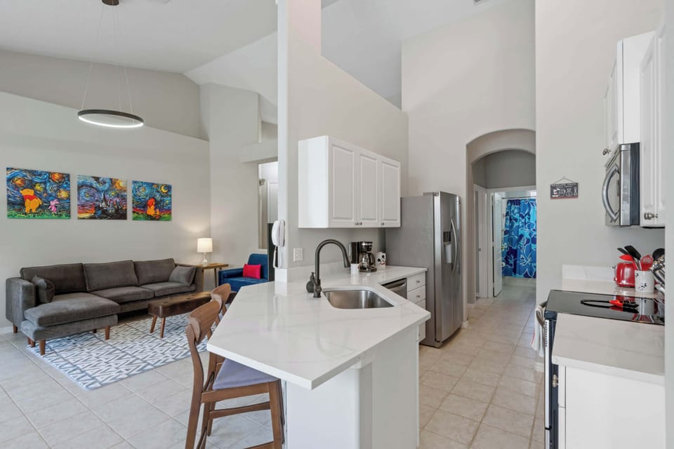 Enjoy the airy flexibility of the open-concept Living/Dining Areas and Kitchen