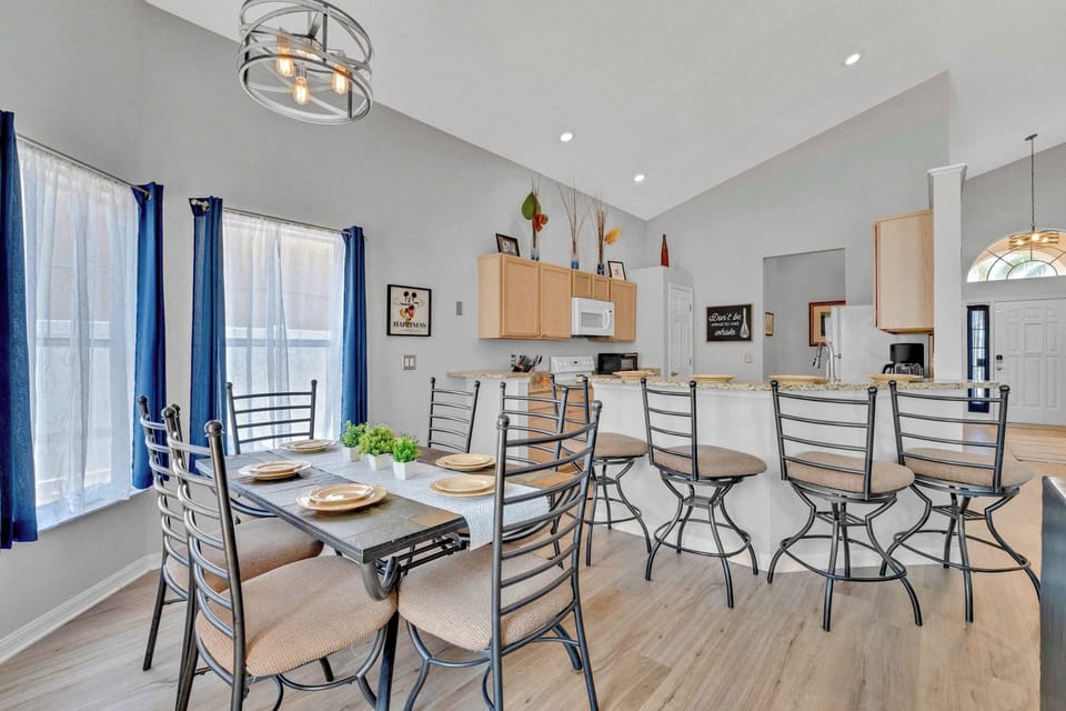 Dining table with seating for 6 and additional counter seating