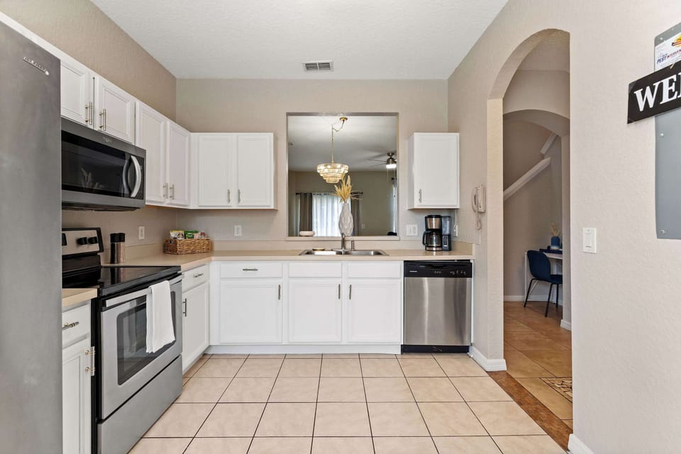 The bright, airy kitchen is well equipped with all the comforts of home